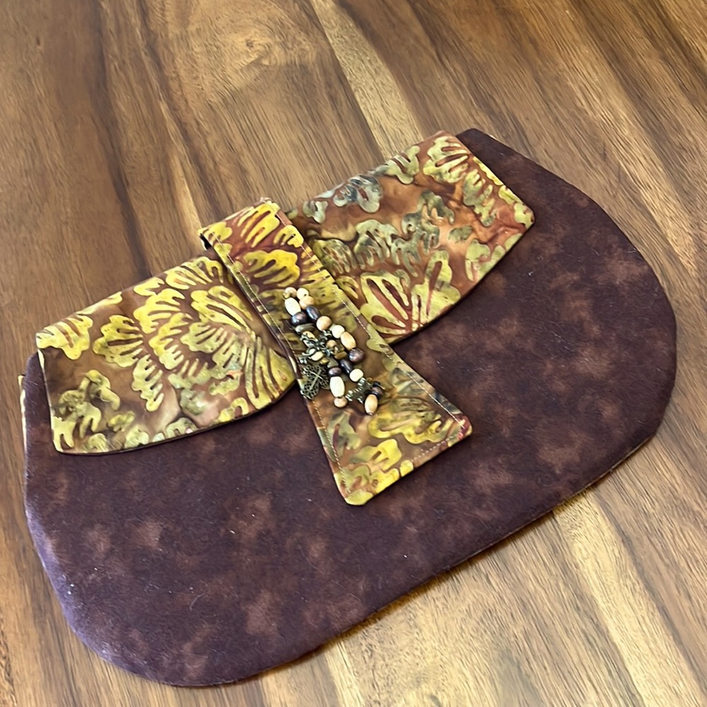 Lovely handmade clutch bag with flap closure